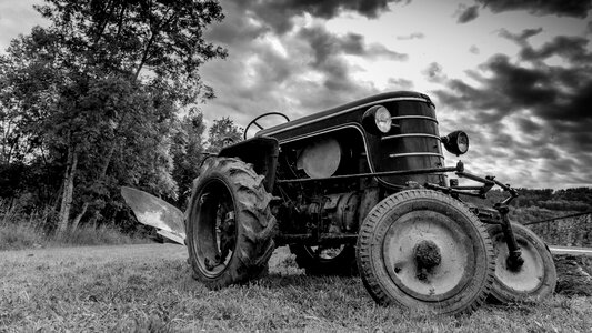 Tractor field work in the fields photo