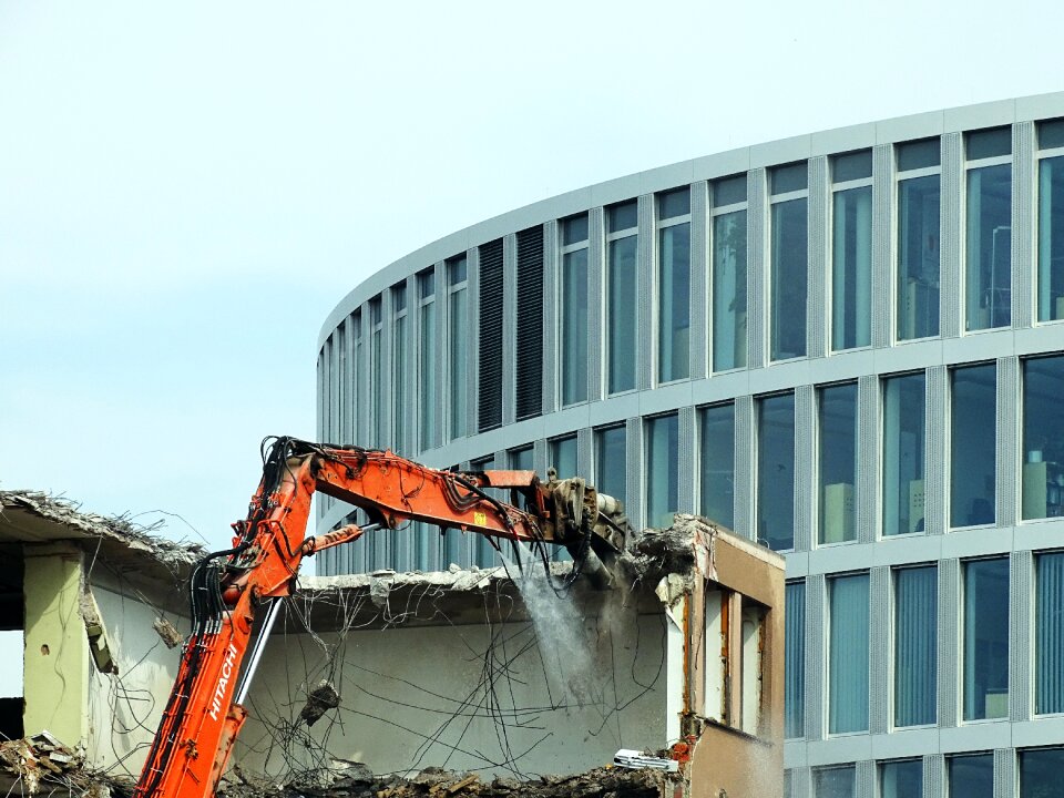 Office building demolition excavators