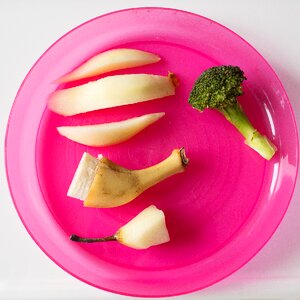 Pink plate baby food fruit