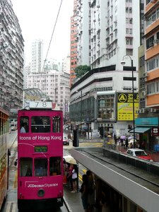 Hong kong double decker street canyon photo