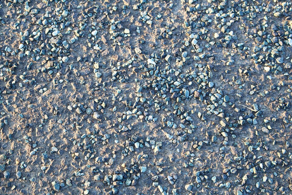Road structure pebbles