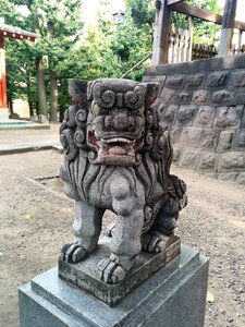 Guardian lion-dog at shinto shrine shrine japan