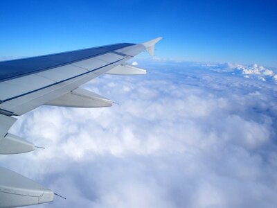 Aircraft flight travel clouds photo