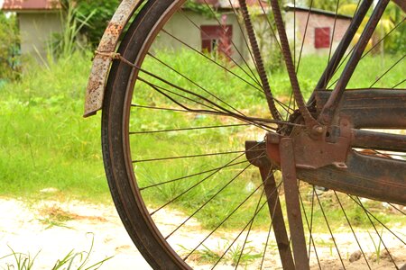 Old rusty bicycle a bicycle wheel