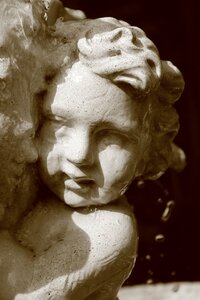 Cherub water sepia photo