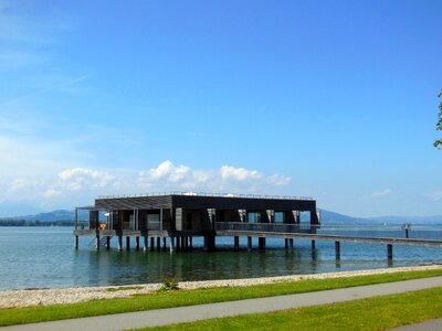 Blue sky stilt houses leaf shape photo