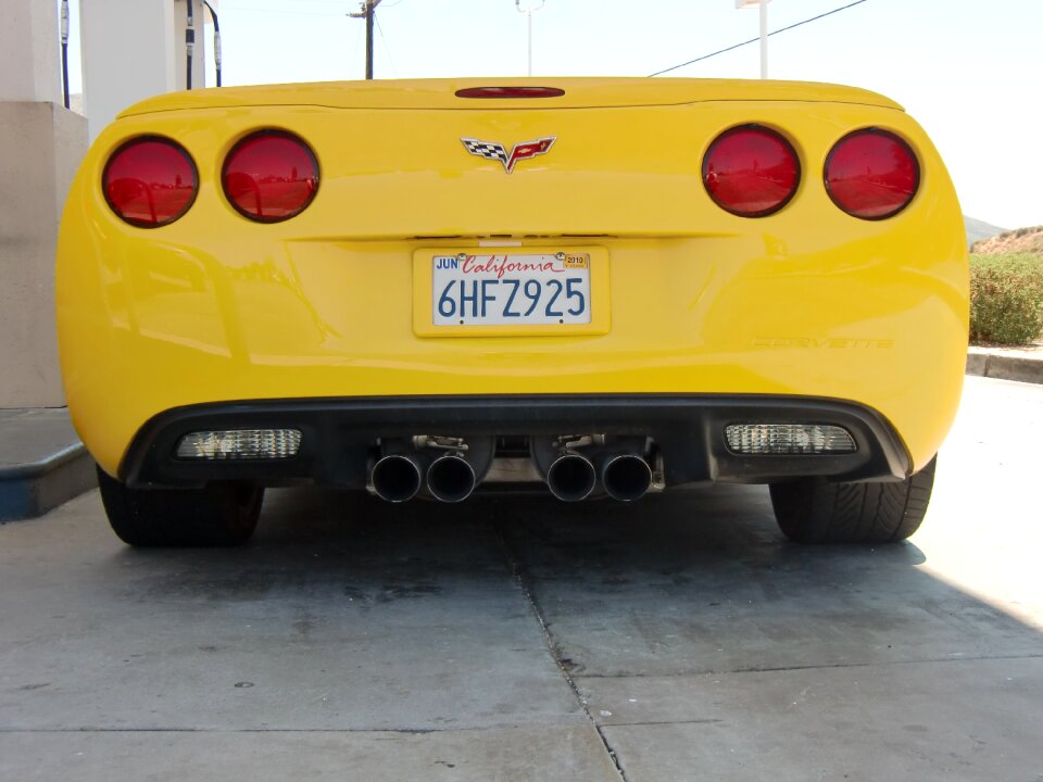Corvette yellow sports car road