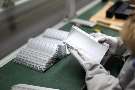 Workshop operator aluminium components