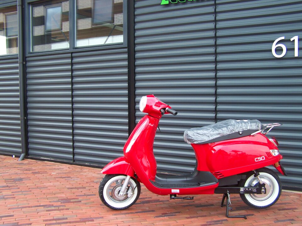 Electric scooter vespa red