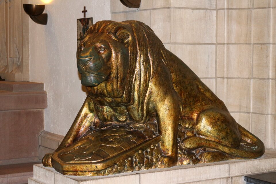 Metal guards bronze statue