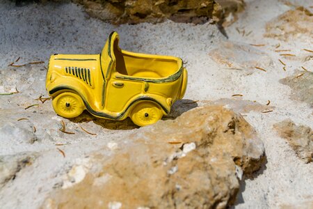 Toy car stones rock