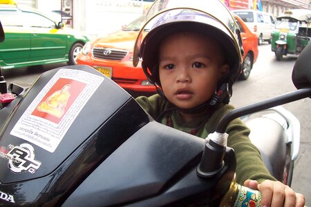 Asia child motorcycle photo