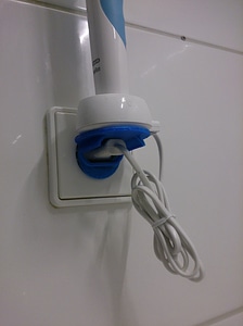 Electric toothbrush holder