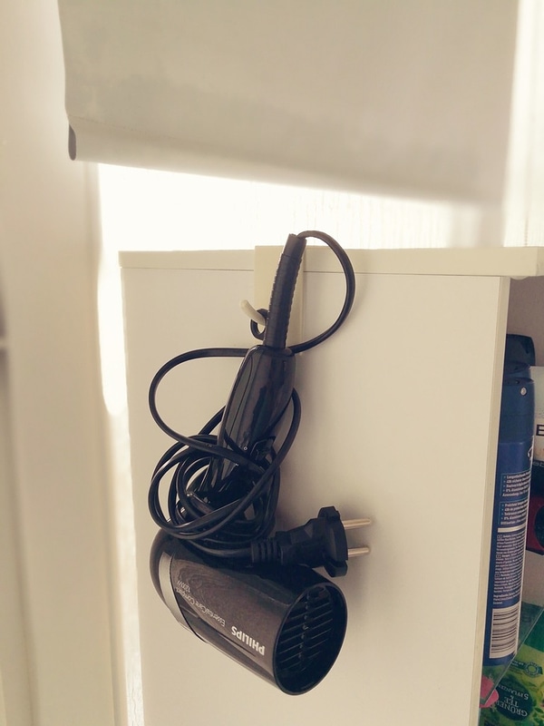 Hanger for hair dryer