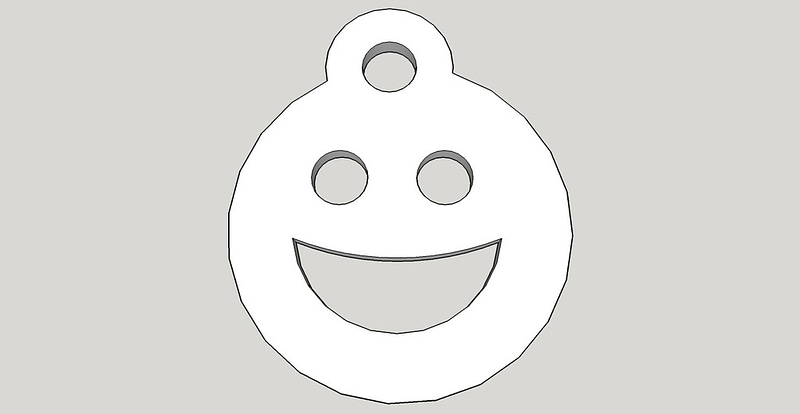 LLAVERO CARA SONRISA