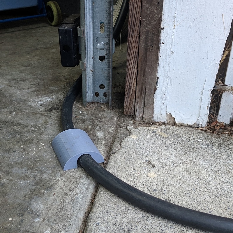 EV Charge Cable Garage Door Pass