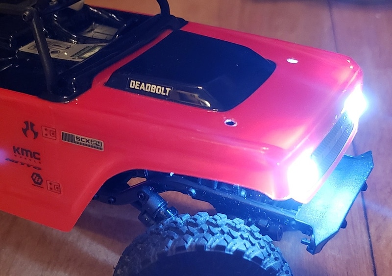 Headlight deadbolt scx24