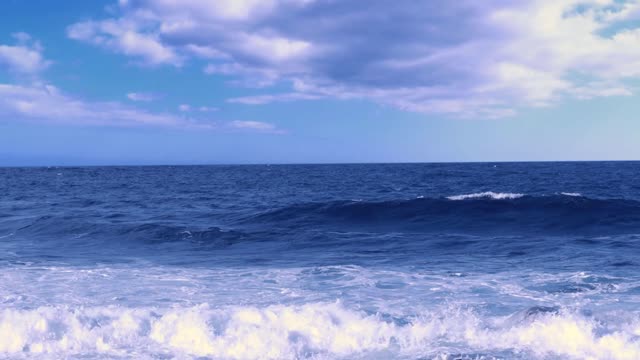Blue ocean clouds sky