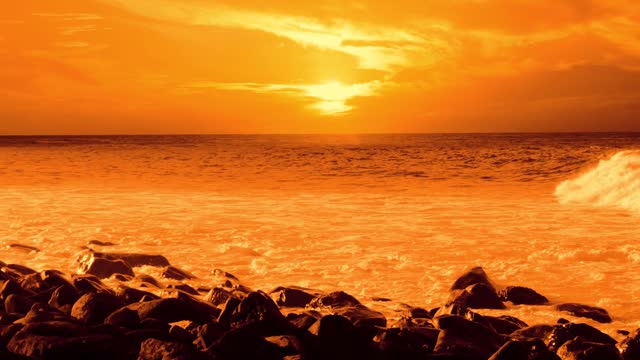Orange sunset ocean waves