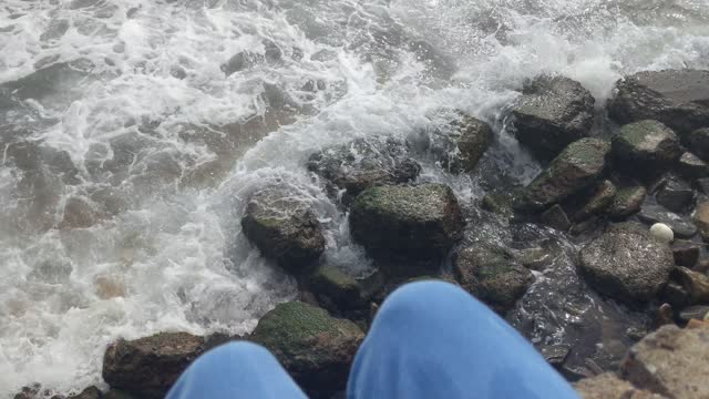 Girl sitting sea