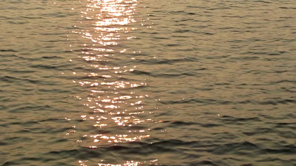 Wildfire smoky lake sunlight water