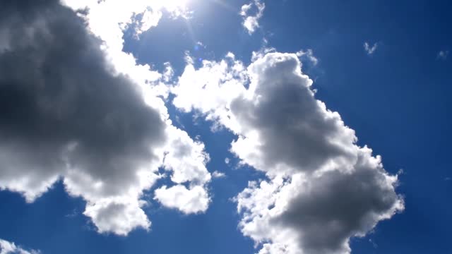 Sky clouds sun