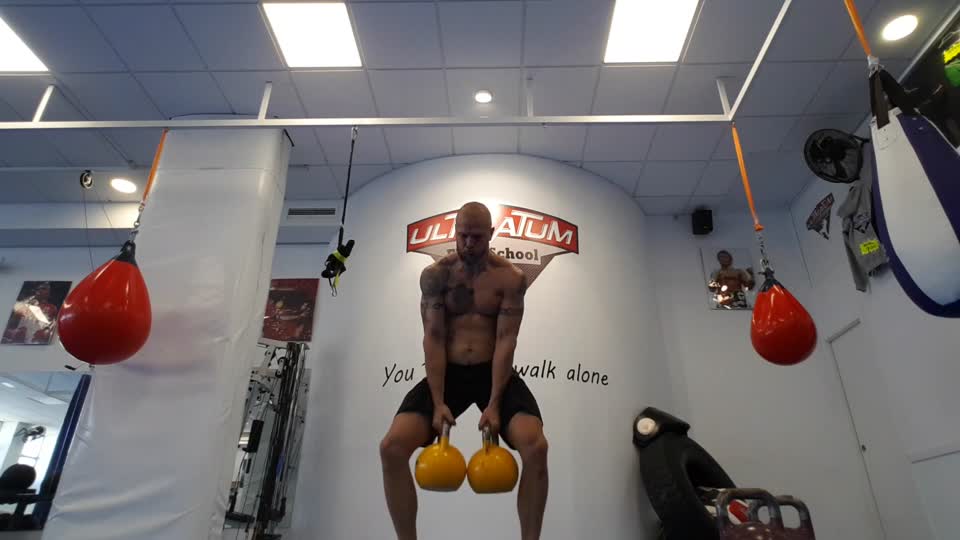 Clean and jerk kettlebell kettlebells