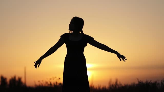 Silhouette dance young woman