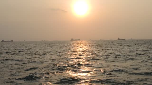 Sunset cargo ship port