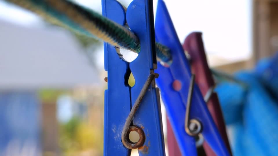Three clothespins pin wobble