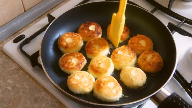 Pancakes syrniki frying pan