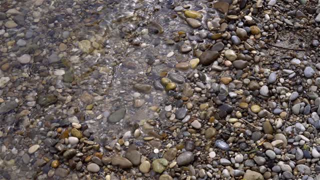Riverbank waves water