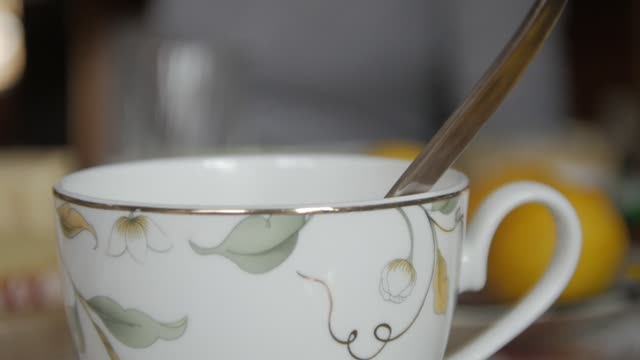 Tea cup give a