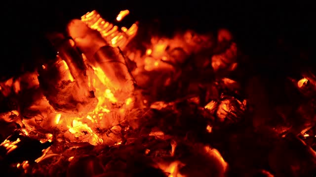 Embers glow fire
