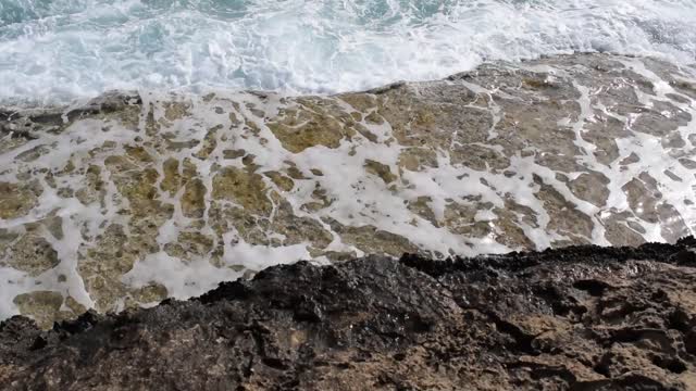 Waves smashing sea