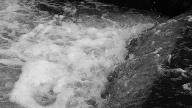 Running water weir river