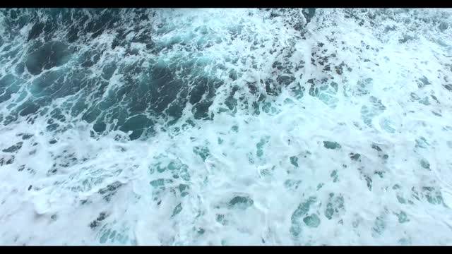 Waves surf sea