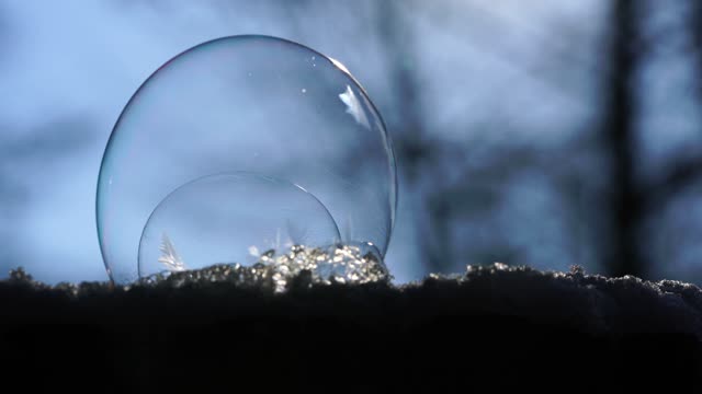 Soap bubble freeze burst
