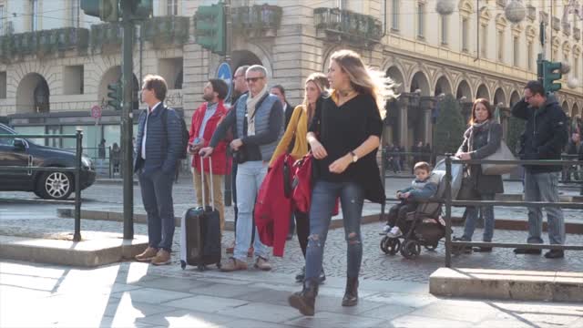 Girls pedestrian crossing city
