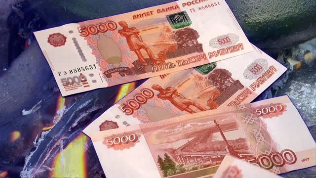 Money rubles fire