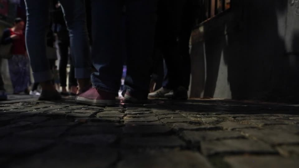 Cobblestones pavement legs