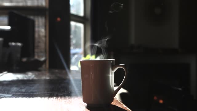 Cup of coffee hot steaming