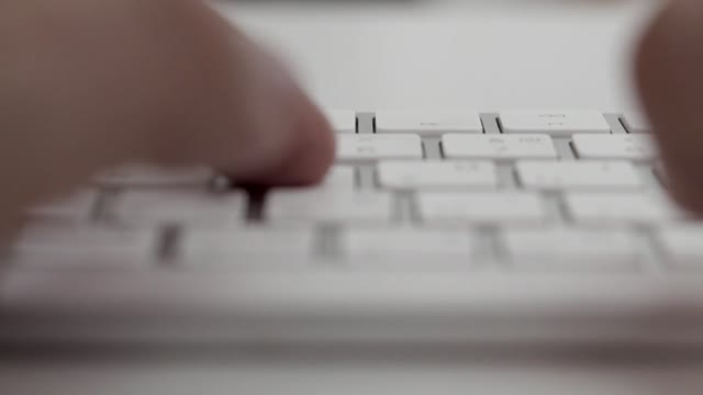 Computer keyboard typing white