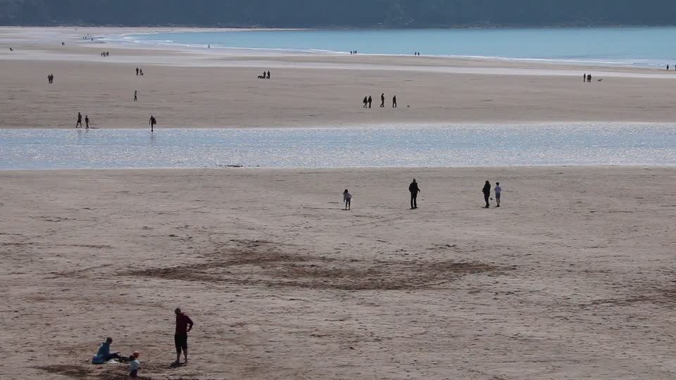 Beach people playing