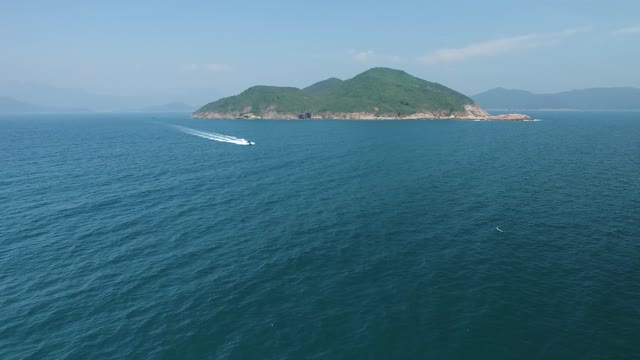 Island motorboat sea