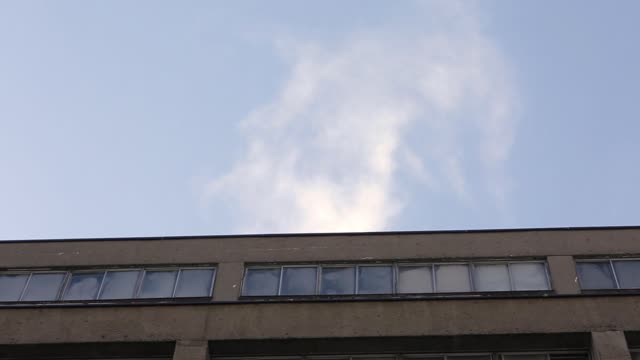Clouds sky building