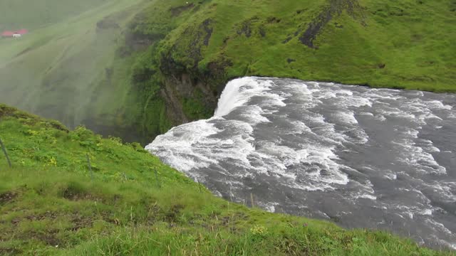 Iceland waterfall flowing