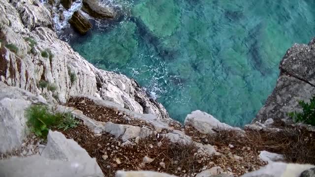 Waves cliff water