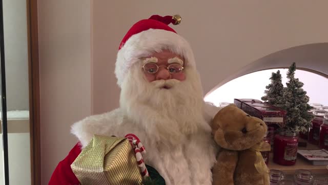 Santa claus singing merry