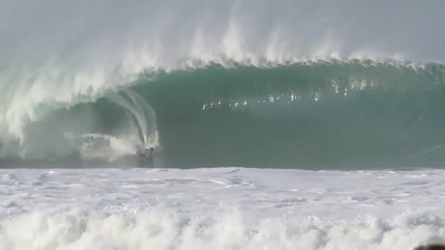 Surfer wave ocean